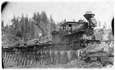 Photo 1910s Train Hauling Lumber on Flatbed Cars  