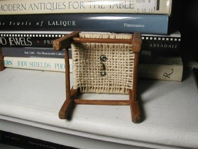   woven cotton thread seat and spindle back. It is all pegged together