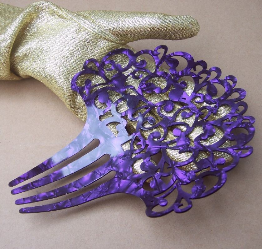   HAIR COMB IN A PRETTY PURPLE INTERLACED PATTERN WITH RHINESTONE TRIM