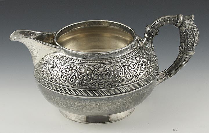 MERIDEN BRITANNIA ASSYRIAN HEAD PATTERN SILVER CREAMER  