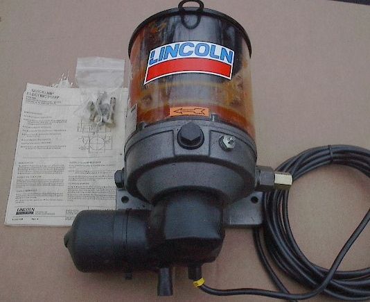   Quicklub P103 2XNKF 1K6 12 a 17, 12 Volt grease pump, 600 36220 7, NOS