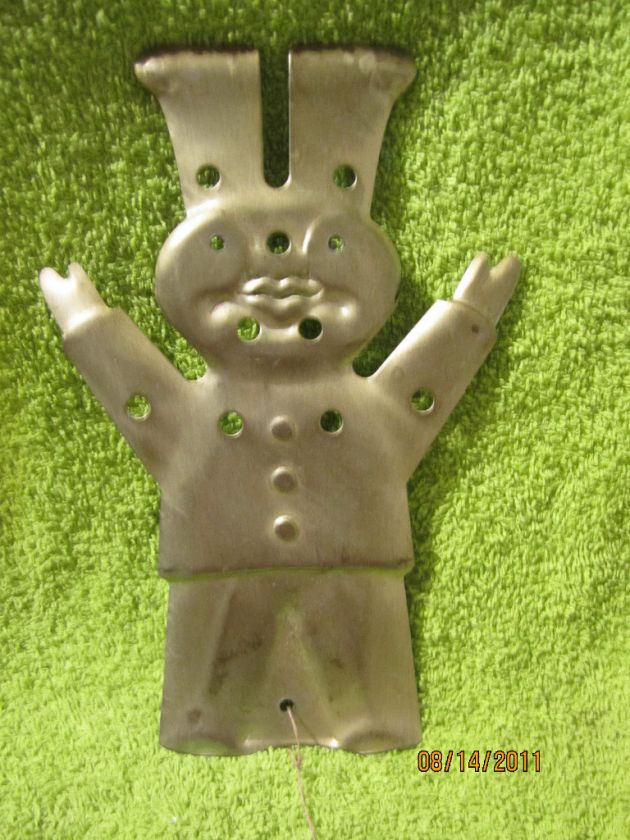 Vintage metal chef doughboy what is it with holes idk  